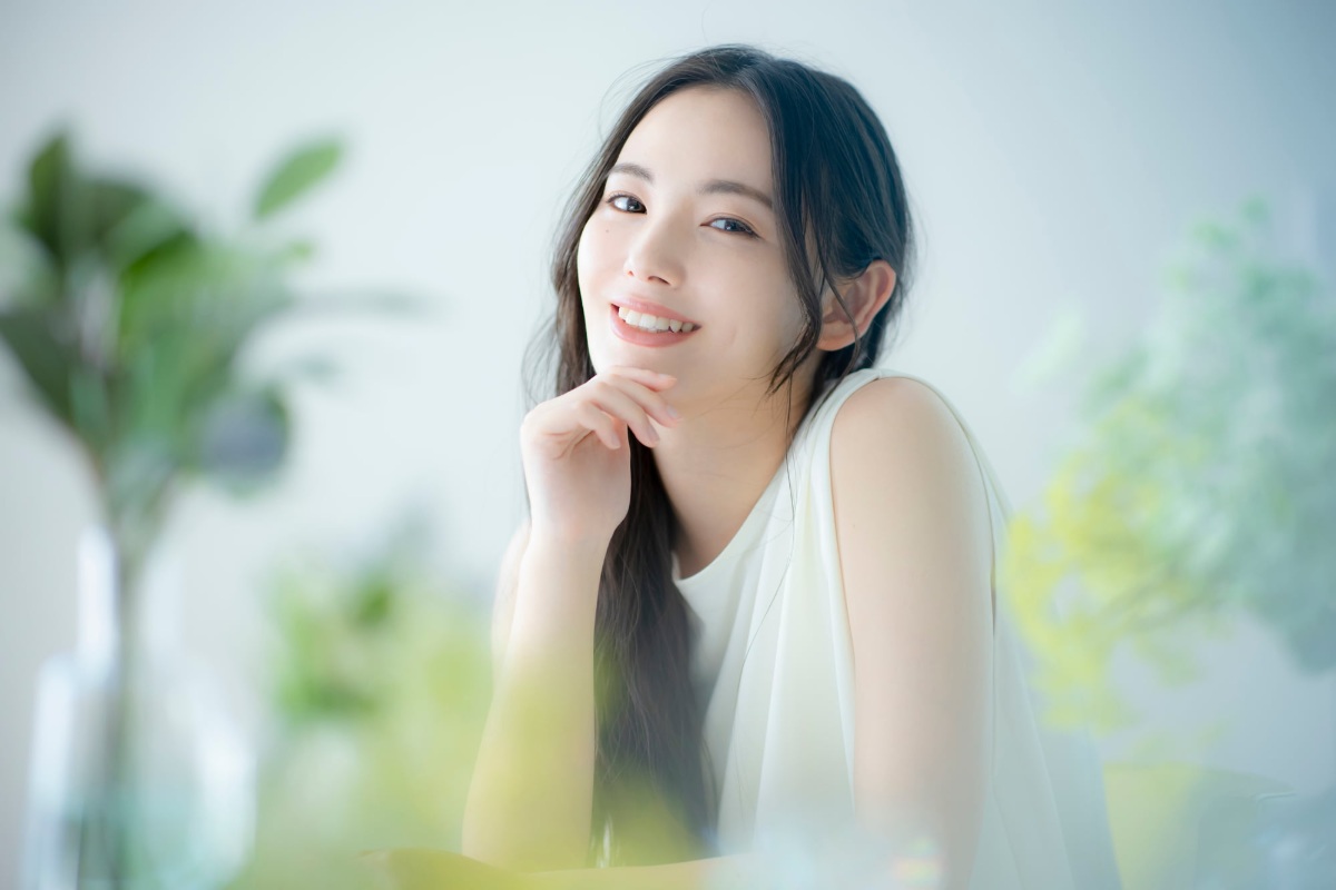 ブラッシング指導を受けて綺麗な歯を保っている笑顔の女性
